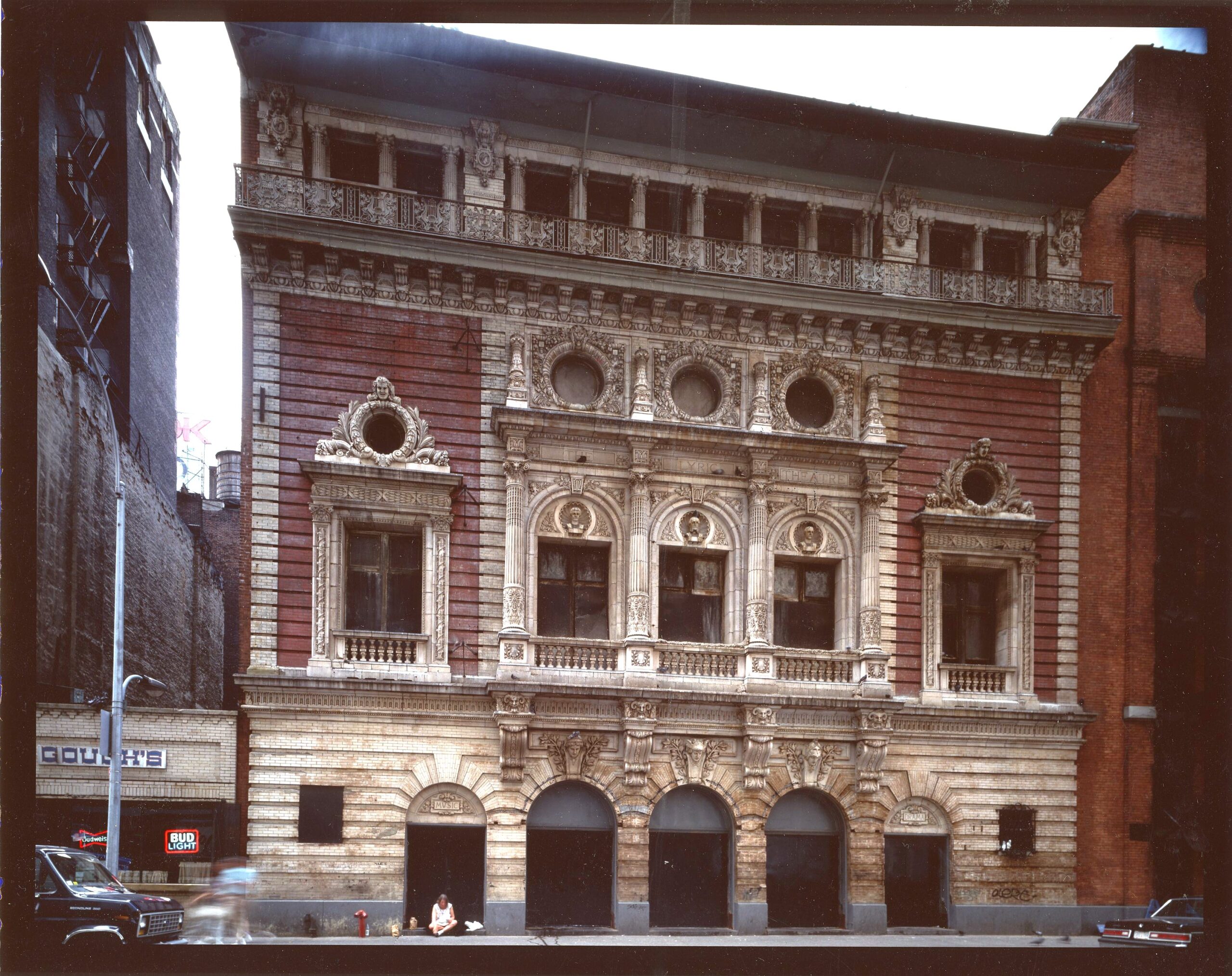 Lyric-Theatre-Facade Lyric Theatre facade with ornate arched doorways, round windows and double balconet detail