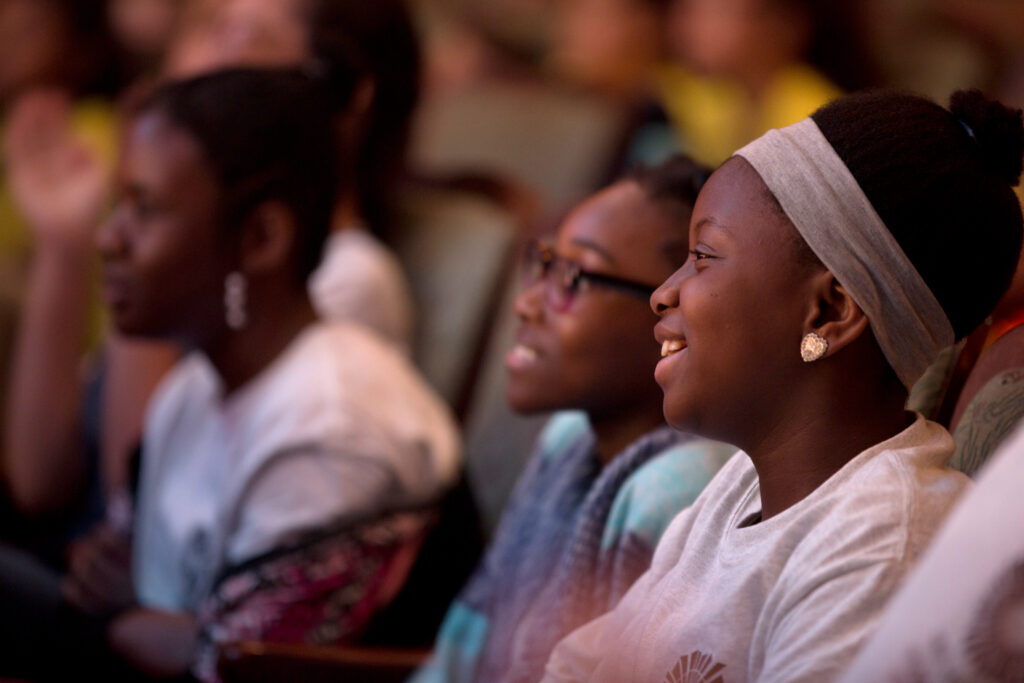 Young girls looking up at a New Victory Dance performance.